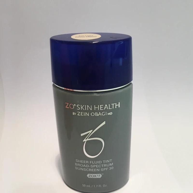 ZO Skin Health Sheer Fluid Tint Broad Spectrum SPF 30 | Ypač lengvas tonizuojantis SPF fluido veidui, atspalvis Light Medium, 50 ml